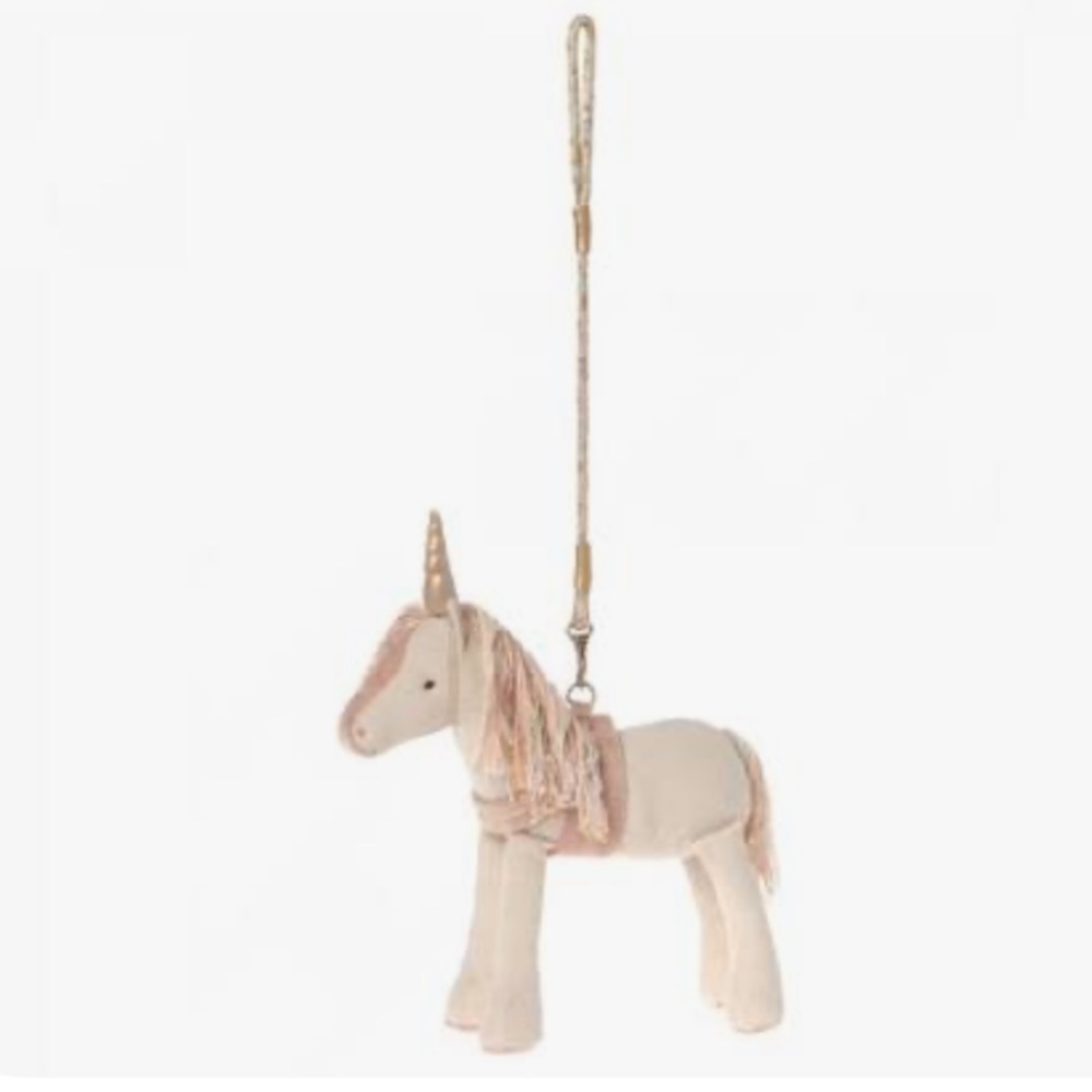 Retired MAILEG unicorn horse on leash